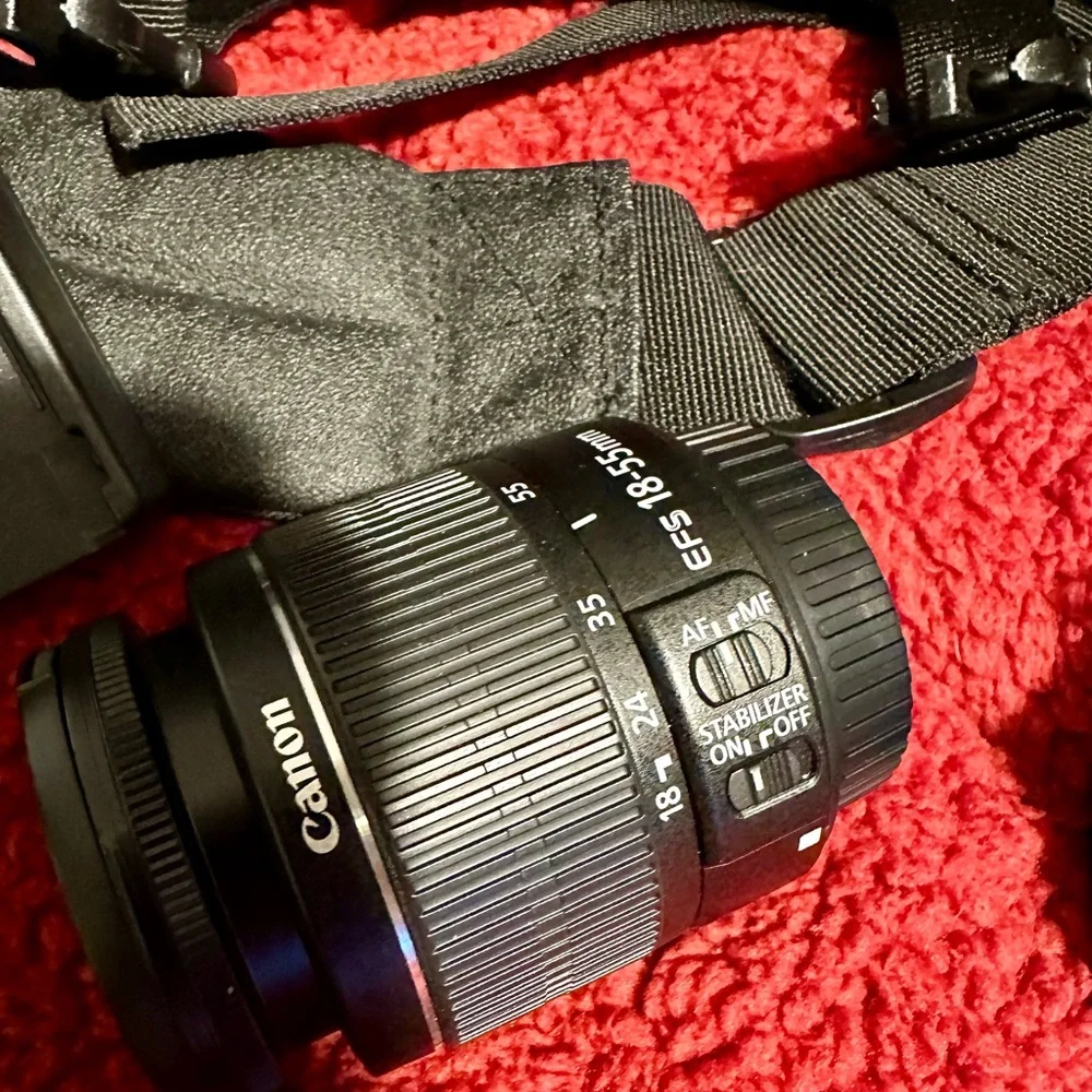 Canon Rebel EOS T2i digital camera , extra long lens, and bag
